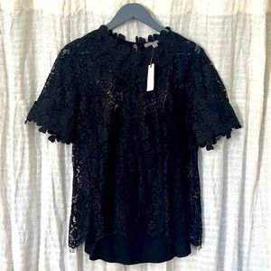 Classic lace blouse with floral design